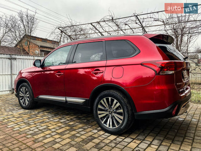 Красный Мицубиси Аутлендер, объемом двигателя 2 л и пробегом 40 тыс. км за 23500 $, фото 15 на Automoto.ua