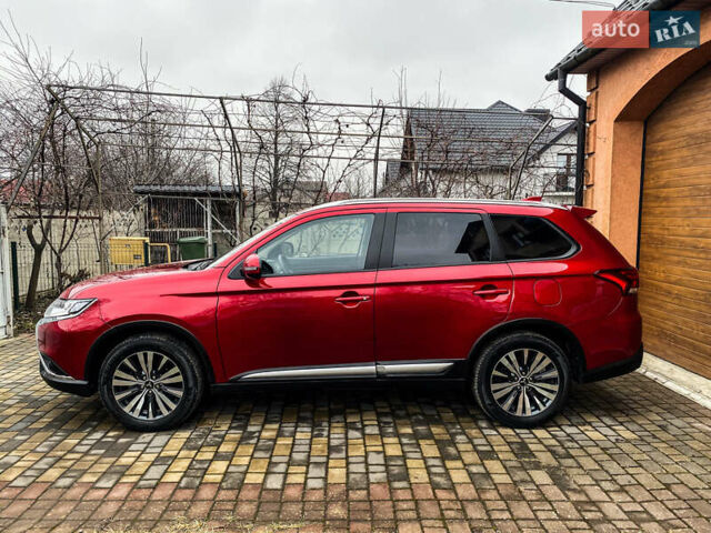 Красный Мицубиси Аутлендер, объемом двигателя 2 л и пробегом 40 тыс. км за 23500 $, фото 16 на Automoto.ua