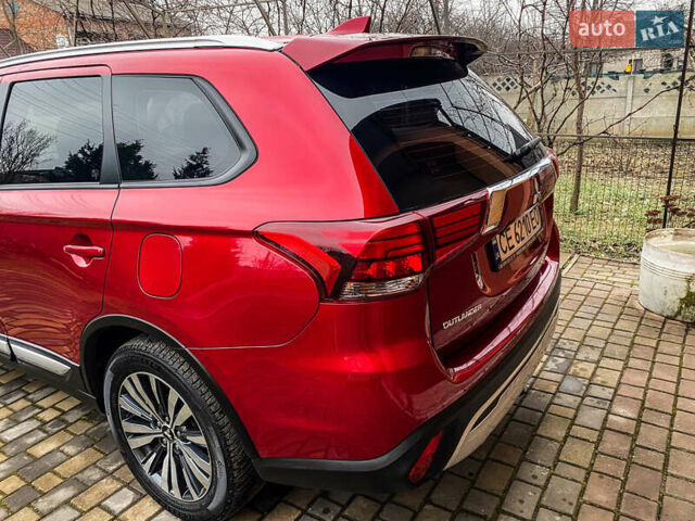 Красный Мицубиси Аутлендер, объемом двигателя 2 л и пробегом 40 тыс. км за 23500 $, фото 13 на Automoto.ua