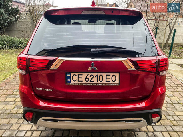 Красный Мицубиси Аутлендер, объемом двигателя 2 л и пробегом 40 тыс. км за 23500 $, фото 17 на Automoto.ua