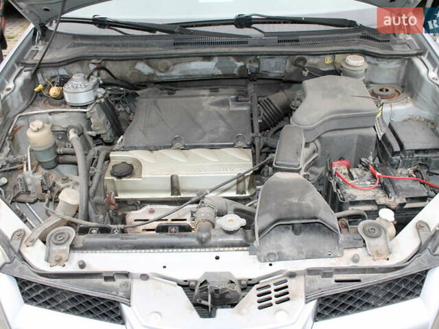 Міцубісі Аутлендер, об'ємом двигуна 2.4 л та пробігом 254 тис. км за 5590 $, фото 2 на Automoto.ua