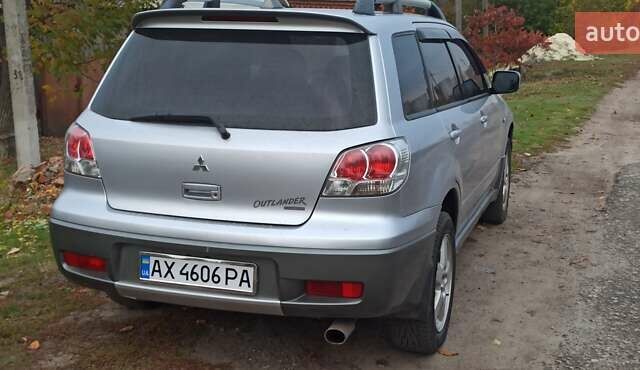 Мицубиси Аутлендер, объемом двигателя 2 л и пробегом 234 тыс. км за 5700 $, фото 1 на Automoto.ua