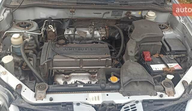 Мицубиси Аутлендер, объемом двигателя 2 л и пробегом 234 тыс. км за 5700 $, фото 3 на Automoto.ua
