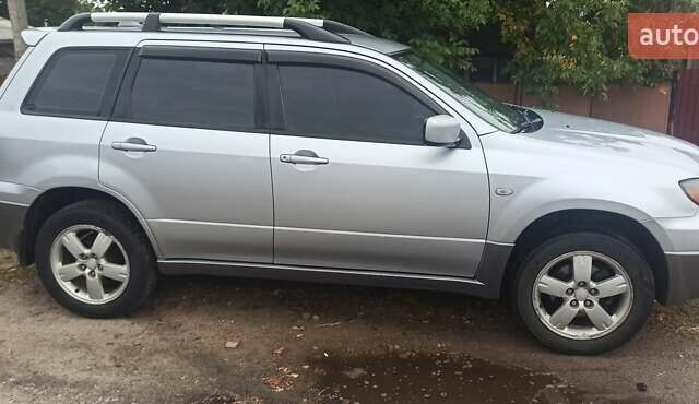 Мицубиси Аутлендер, объемом двигателя 2 л и пробегом 234 тыс. км за 5700 $, фото 13 на Automoto.ua