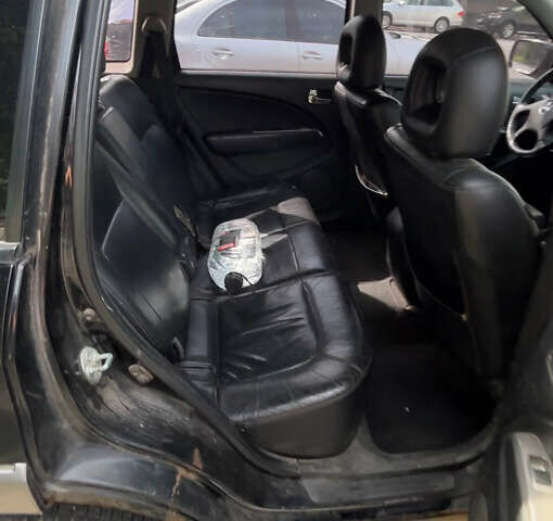 Мицубиси Аутлендер, объемом двигателя 2.4 л и пробегом 300 тыс. км за 3999 $, фото 6 на Automoto.ua