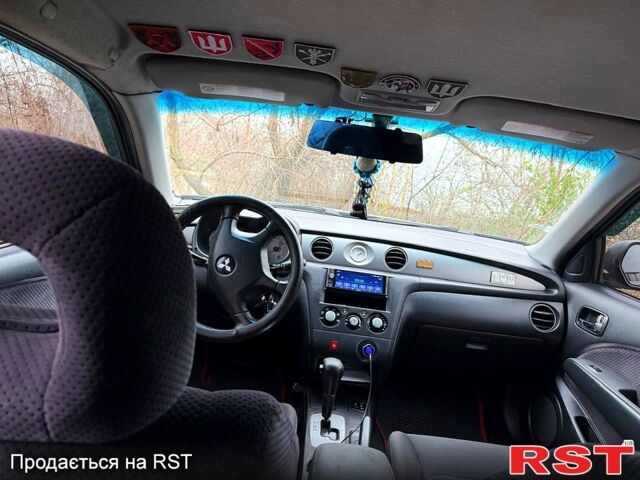 Мицубиси Аутлендер, объемом двигателя 2.4 л и пробегом 407 тыс. км за 5700 $, фото 5 на Automoto.ua