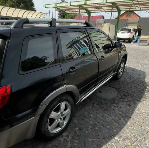 Мицубиси Аутлендер, объемом двигателя 2.4 л и пробегом 300 тыс. км за 3999 $, фото 2 на Automoto.ua