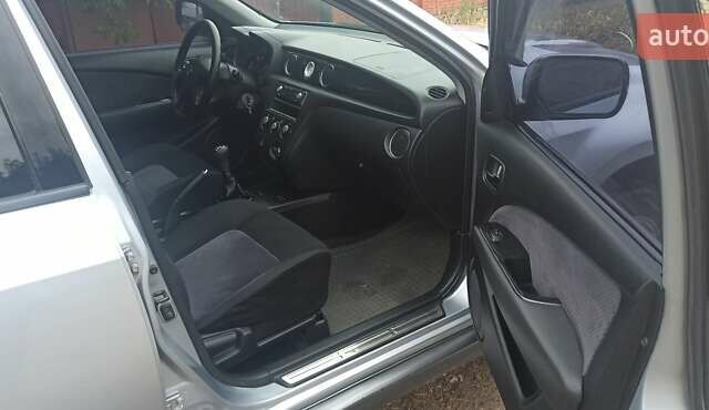 Мицубиси Аутлендер, объемом двигателя 2 л и пробегом 234 тыс. км за 5700 $, фото 9 на Automoto.ua