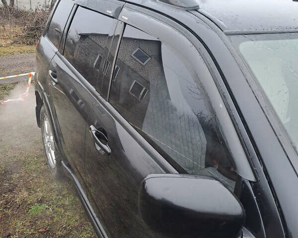 Мицубиси Аутлендер, объемом двигателя 2.4 л и пробегом 210 тыс. км за 6200 $, фото 6 на Automoto.ua