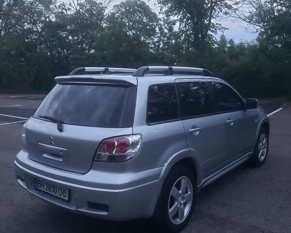 Мицубиси Аутлендер, объемом двигателя 2.4 л и пробегом 350 тыс. км за 4600 $, фото 8 на Automoto.ua