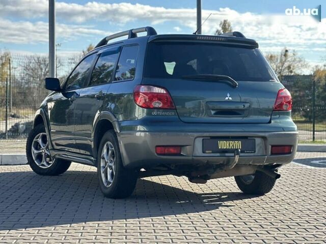 Мицубиси Аутлендер, объемом двигателя 2.4 л и пробегом 275 тыс. км за 7350 $, фото 20 на Automoto.ua