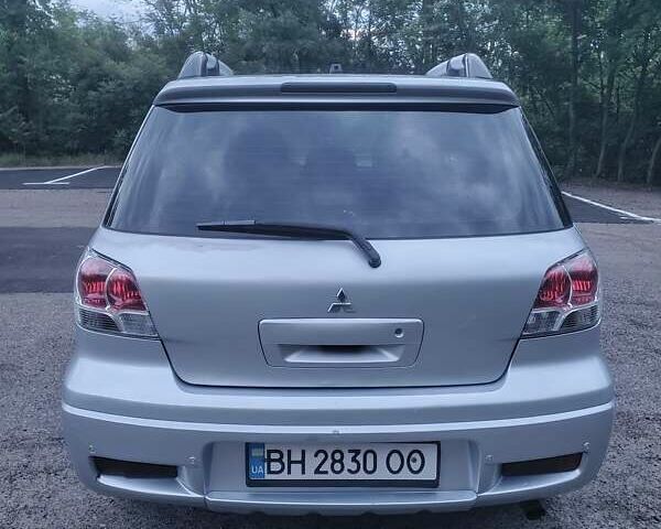 Мицубиси Аутлендер, объемом двигателя 2.4 л и пробегом 350 тыс. км за 4600 $, фото 3 на Automoto.ua