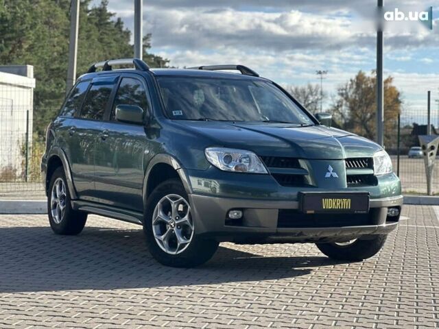Мицубиси Аутлендер, объемом двигателя 2.4 л и пробегом 275 тыс. км за 7350 $, фото 9 на Automoto.ua
