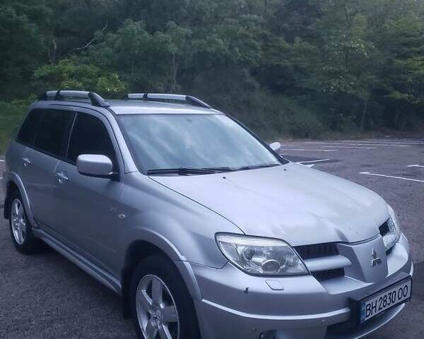 Мицубиси Аутлендер, объемом двигателя 2.4 л и пробегом 350 тыс. км за 4600 $, фото 1 на Automoto.ua