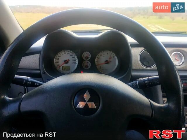 Мицубиси Аутлендер, объемом двигателя 2 л и пробегом 218 тыс. км за 6500 $, фото 2 на Automoto.ua