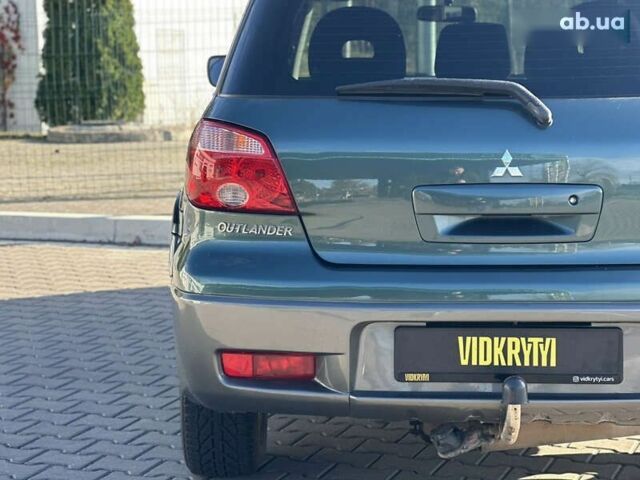 Мицубиси Аутлендер, объемом двигателя 2.4 л и пробегом 275 тыс. км за 7350 $, фото 14 на Automoto.ua