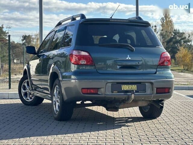Мицубиси Аутлендер, объемом двигателя 2.4 л и пробегом 275 тыс. км за 7350 $, фото 19 на Automoto.ua