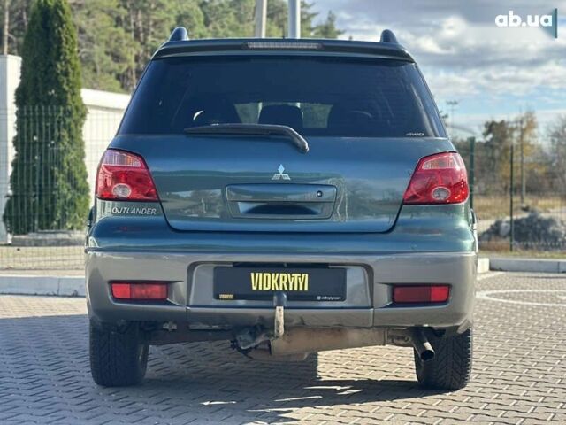 Мицубиси Аутлендер, объемом двигателя 2.4 л и пробегом 275 тыс. км за 7350 $, фото 13 на Automoto.ua