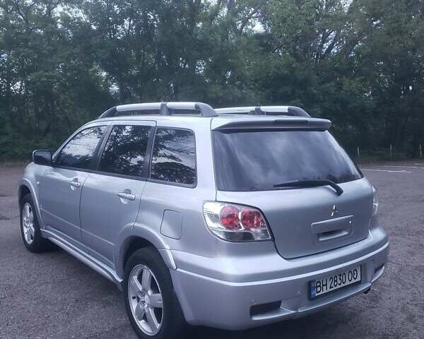 Мицубиси Аутлендер, объемом двигателя 2.4 л и пробегом 350 тыс. км за 4600 $, фото 6 на Automoto.ua