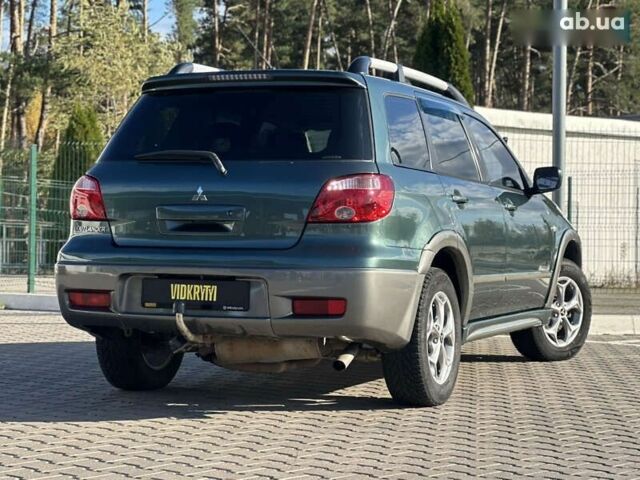 Мицубиси Аутлендер, объемом двигателя 2.4 л и пробегом 275 тыс. км за 7350 $, фото 16 на Automoto.ua