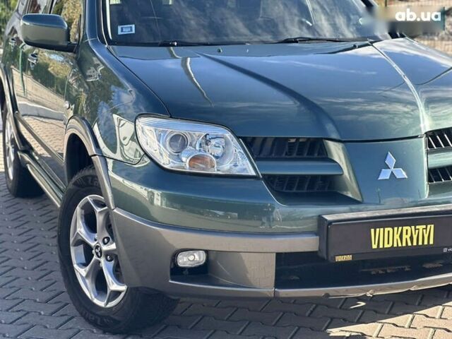 Мицубиси Аутлендер, объемом двигателя 2.4 л и пробегом 275 тыс. км за 7350 $, фото 7 на Automoto.ua