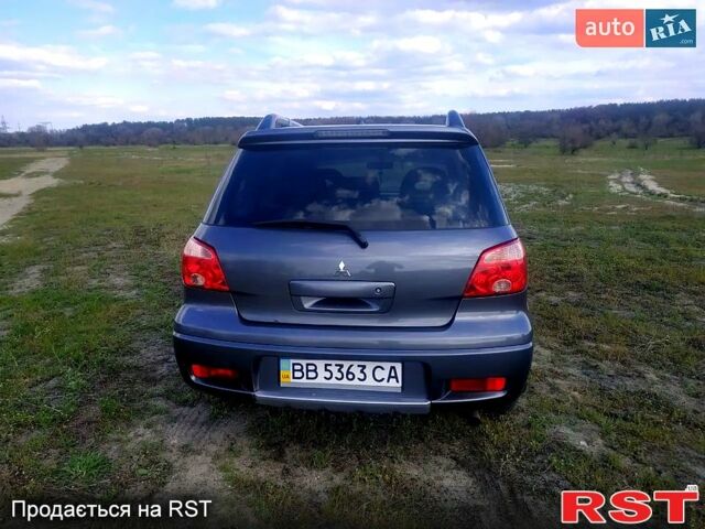 Мицубиси Аутлендер, объемом двигателя 2 л и пробегом 218 тыс. км за 6500 $, фото 1 на Automoto.ua