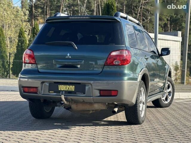 Мицубиси Аутлендер, объемом двигателя 2.4 л и пробегом 275 тыс. км за 7350 $, фото 15 на Automoto.ua