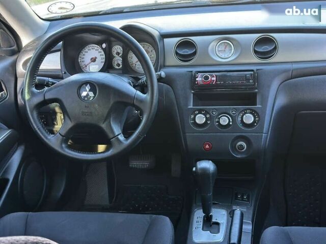 Мицубиси Аутлендер, объемом двигателя 2.4 л и пробегом 275 тыс. км за 7350 $, фото 25 на Automoto.ua