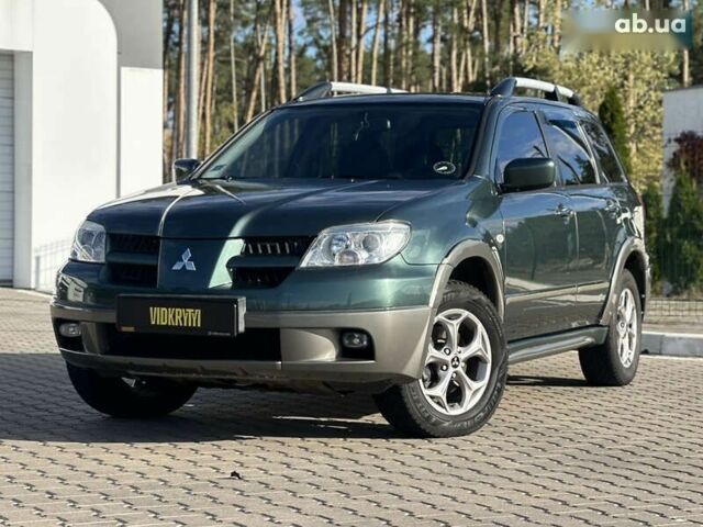 Мицубиси Аутлендер, объемом двигателя 2.4 л и пробегом 275 тыс. км за 7350 $, фото 1 на Automoto.ua