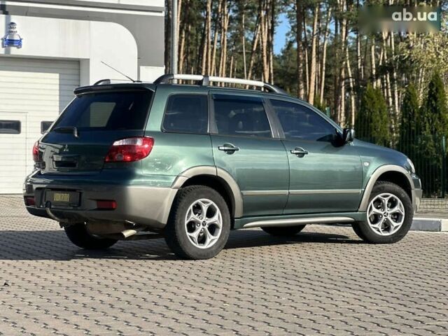 Мицубиси Аутлендер, объемом двигателя 2.4 л и пробегом 275 тыс. км за 7350 $, фото 10 на Automoto.ua