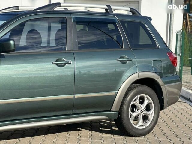 Мицубиси Аутлендер, объемом двигателя 2.4 л и пробегом 275 тыс. км за 7350 $, фото 6 на Automoto.ua