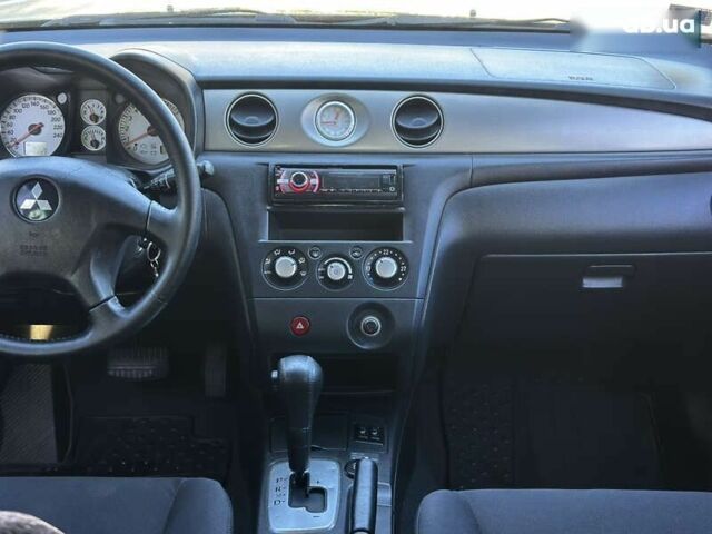 Мицубиси Аутлендер, объемом двигателя 2.4 л и пробегом 275 тыс. км за 7350 $, фото 26 на Automoto.ua