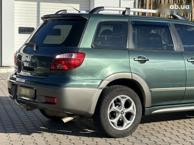 Мицубиси Аутлендер, объемом двигателя 2.4 л и пробегом 275 тыс. км за 7350 $, фото 11 на Automoto.ua