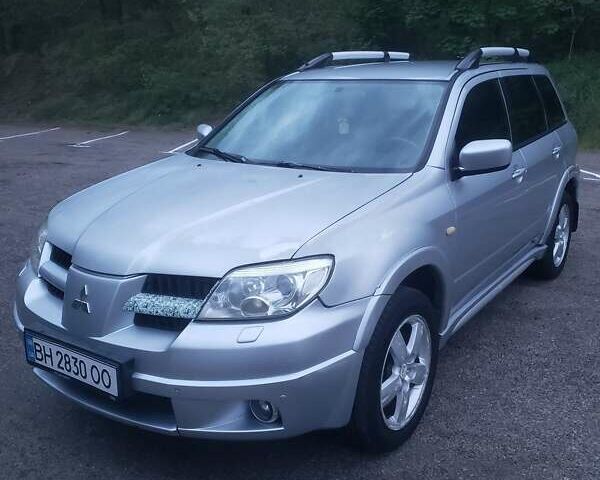 Мицубиси Аутлендер, объемом двигателя 2.4 л и пробегом 350 тыс. км за 4600 $, фото 5 на Automoto.ua