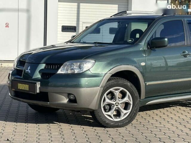 Мицубиси Аутлендер, объемом двигателя 2.4 л и пробегом 275 тыс. км за 7350 $, фото 5 на Automoto.ua