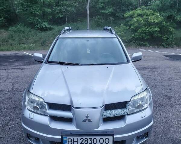 Мицубиси Аутлендер, объемом двигателя 2.4 л и пробегом 350 тыс. км за 4600 $, фото 4 на Automoto.ua