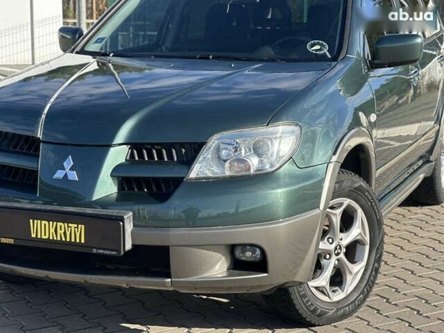 Мицубиси Аутлендер, объемом двигателя 2.4 л и пробегом 275 тыс. км за 7350 $, фото 3 на Automoto.ua