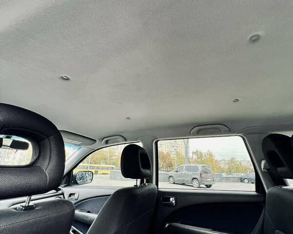 Мицубиси Аутлендер, объемом двигателя 2 л и пробегом 163 тыс. км за 7300 $, фото 11 на Automoto.ua