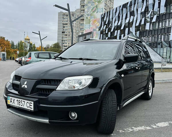 Мицубиси Аутлендер, объемом двигателя 2 л и пробегом 163 тыс. км за 7300 $, фото 23 на Automoto.ua