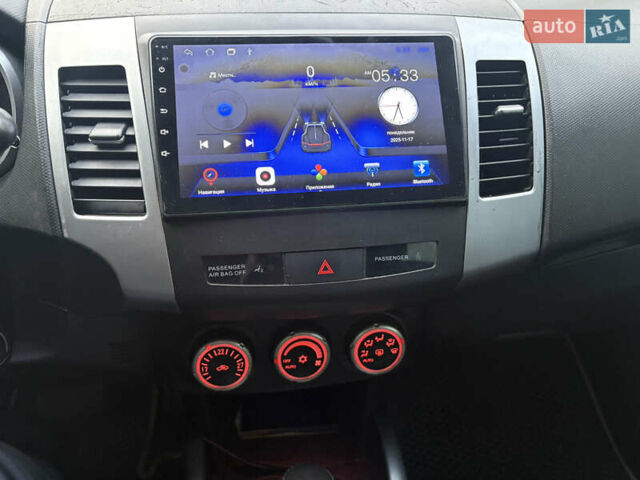 Мицубиси Аутлендер, объемом двигателя 2.36 л и пробегом 250 тыс. км за 7700 $, фото 14 на Automoto.ua