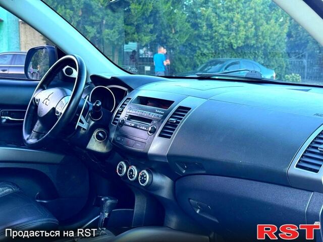 Мицубиси Аутлендер 2008 в Ахтырке на Automoto.ua Мицубиси Аутлендер, объемом двигателя 2.4 л и пробегом 179 тыс. км за 8999 $, фото 4 на Automoto.ua