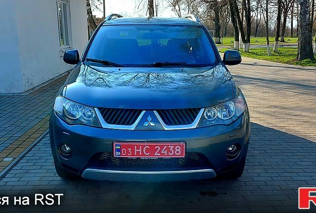 Мицубиси Аутлендер, объемом двигателя 2 л и пробегом 250 тыс. км за 9000 $, фото 2 на Automoto.ua