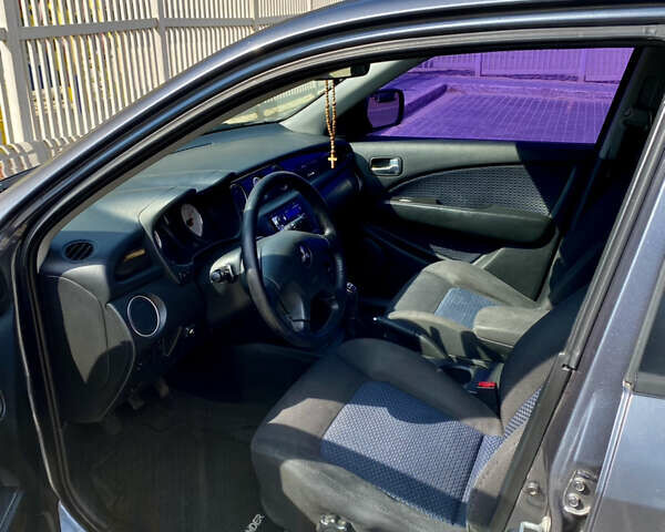 Мицубиси Аутлендер, объемом двигателя 2 л и пробегом 212 тыс. км за 6900 $, фото 5 на Automoto.ua