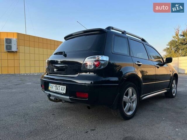 Мицубиси Аутлендер, объемом двигателя 2 л и пробегом 204 тыс. км за 7600 $, фото 5 на Automoto.ua