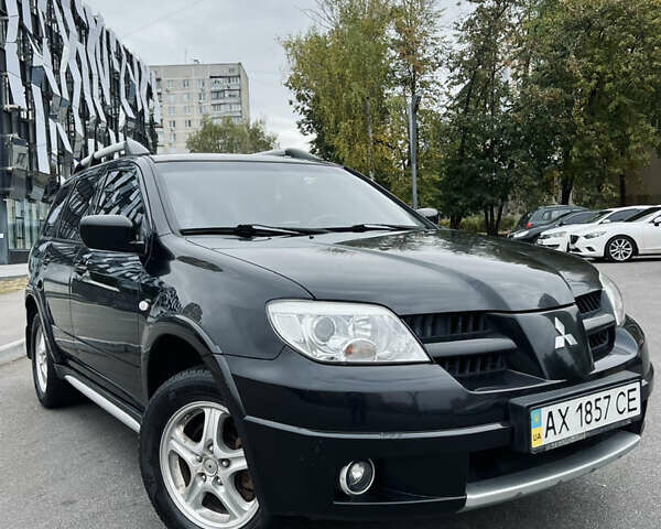 Мицубиси Аутлендер, объемом двигателя 2 л и пробегом 163 тыс. км за 7300 $, фото 3 на Automoto.ua