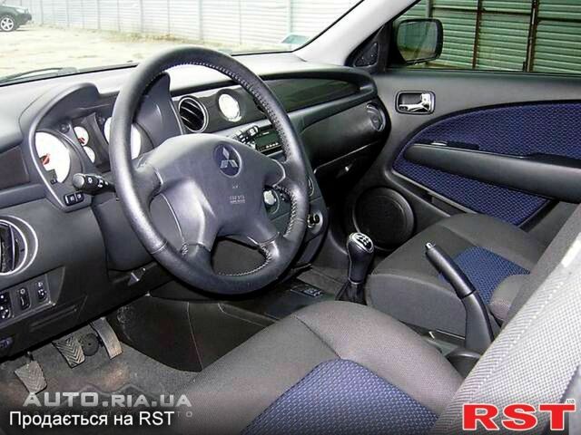 Мицубиси Аутлендер, объемом двигателя 2 л и пробегом 340 тыс. км за 9200 $, фото 2 на Automoto.ua