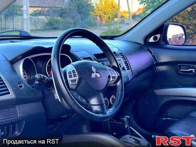 Мицубиси Аутлендер 2008 в Ахтырке на Automoto.ua Мицубиси Аутлендер, объемом двигателя 2.4 л и пробегом 179 тыс. км за 8999 $, фото 3 на Automoto.ua