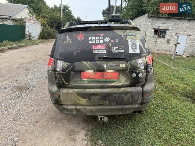 Мицубиси Аутлендер, объемом двигателя 2.2 л и пробегом 280 тыс. км за 12121 $, фото 3 на Automoto.ua