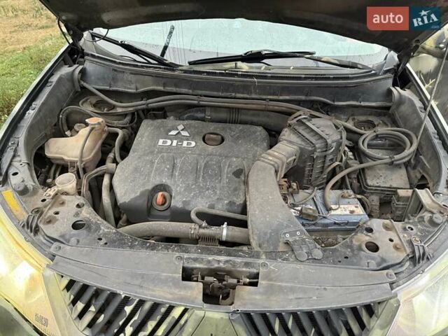 Мицубиси Аутлендер, объемом двигателя 2.2 л и пробегом 280 тыс. км за 12121 $, фото 6 на Automoto.ua