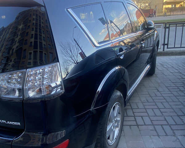 Мицубиси Аутлендер, объемом двигателя 2 л и пробегом 203 тыс. км за 10500 $, фото 3 на Automoto.ua